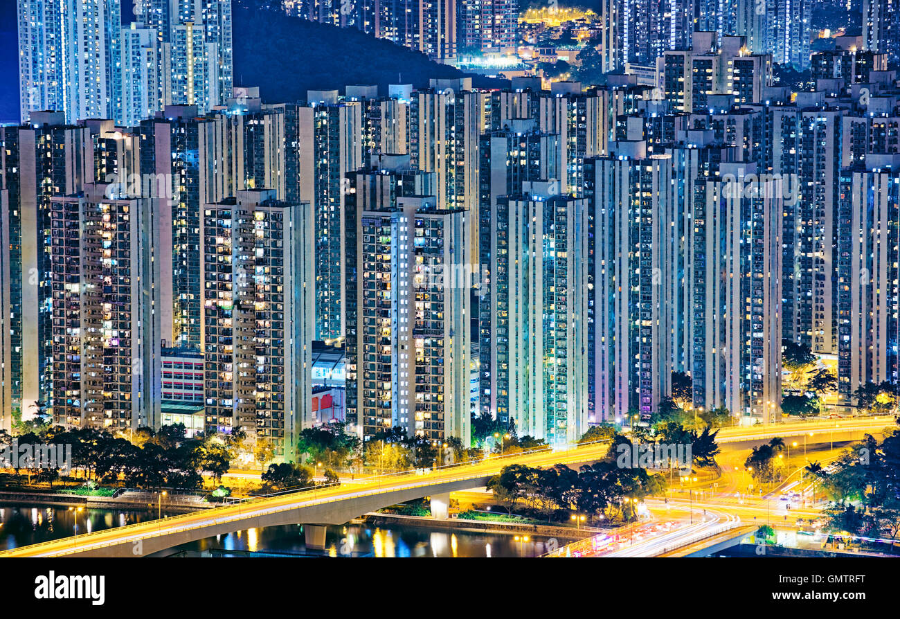 Hong Kong Public living downtown at night Stock Photo - Alamy
