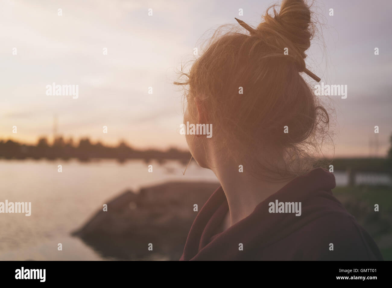 portrait of teenage girl on embankment in sunset Stock Photo - Alamy