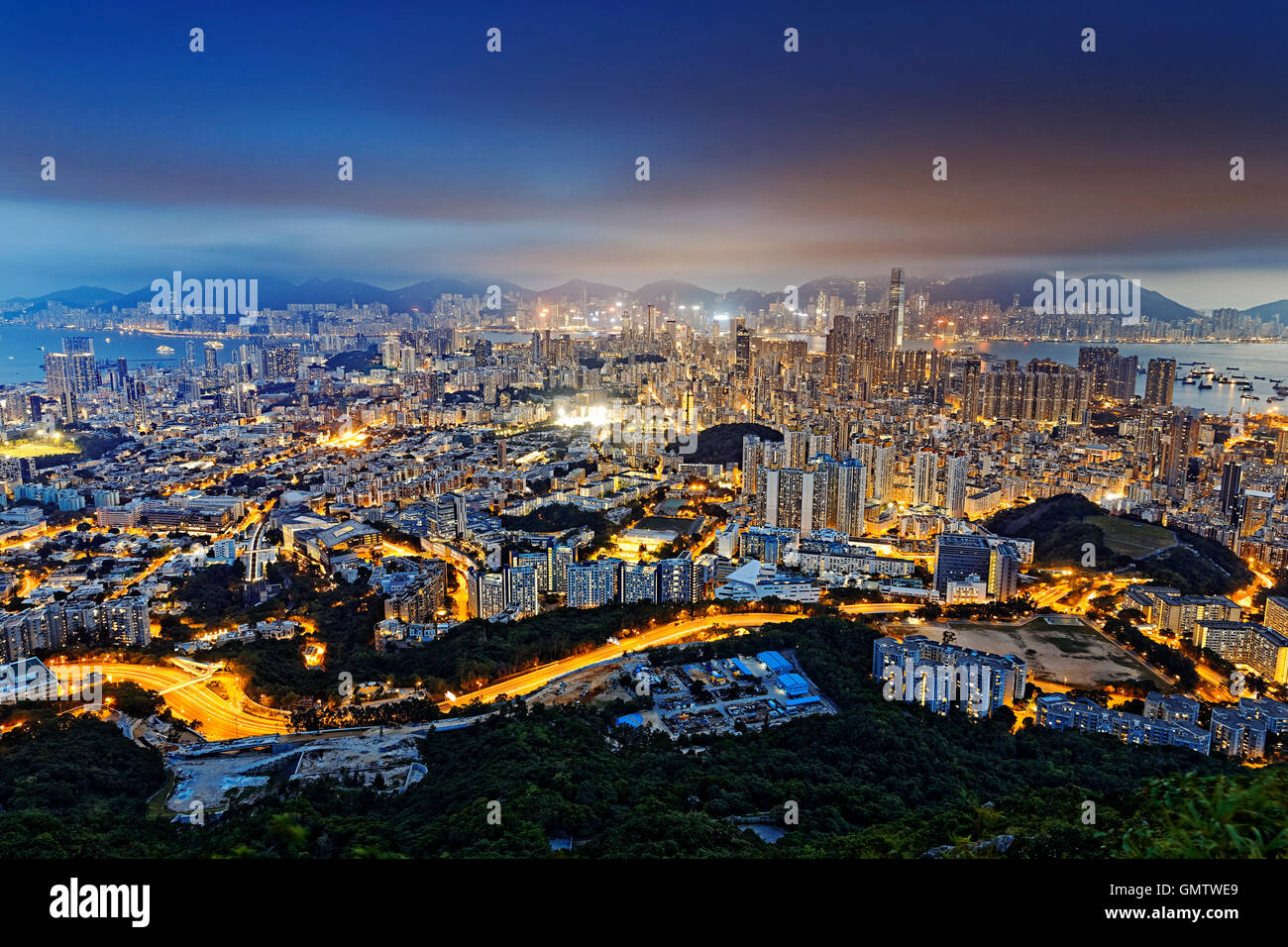 Residential building in Hong Kong at night Stock Photo - Alamy