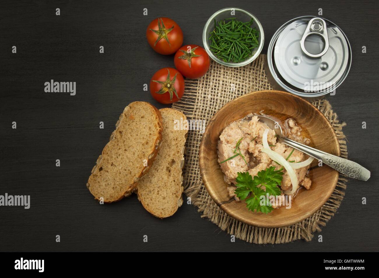 Crushed tuna canned. The fishing industry, canned fish. Diet food