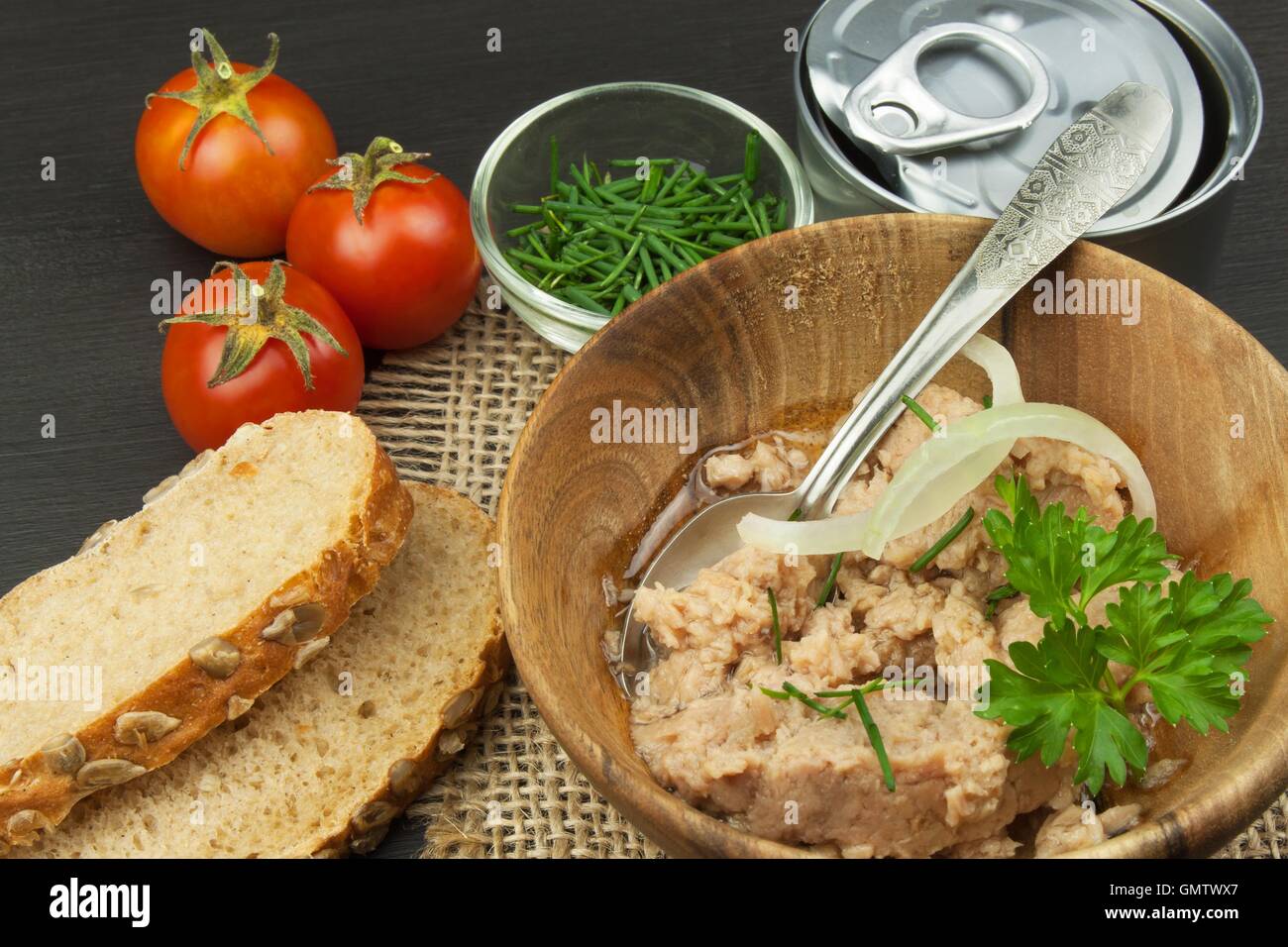 Crushed tuna canned. The fishing industry, canned fish. Diet food