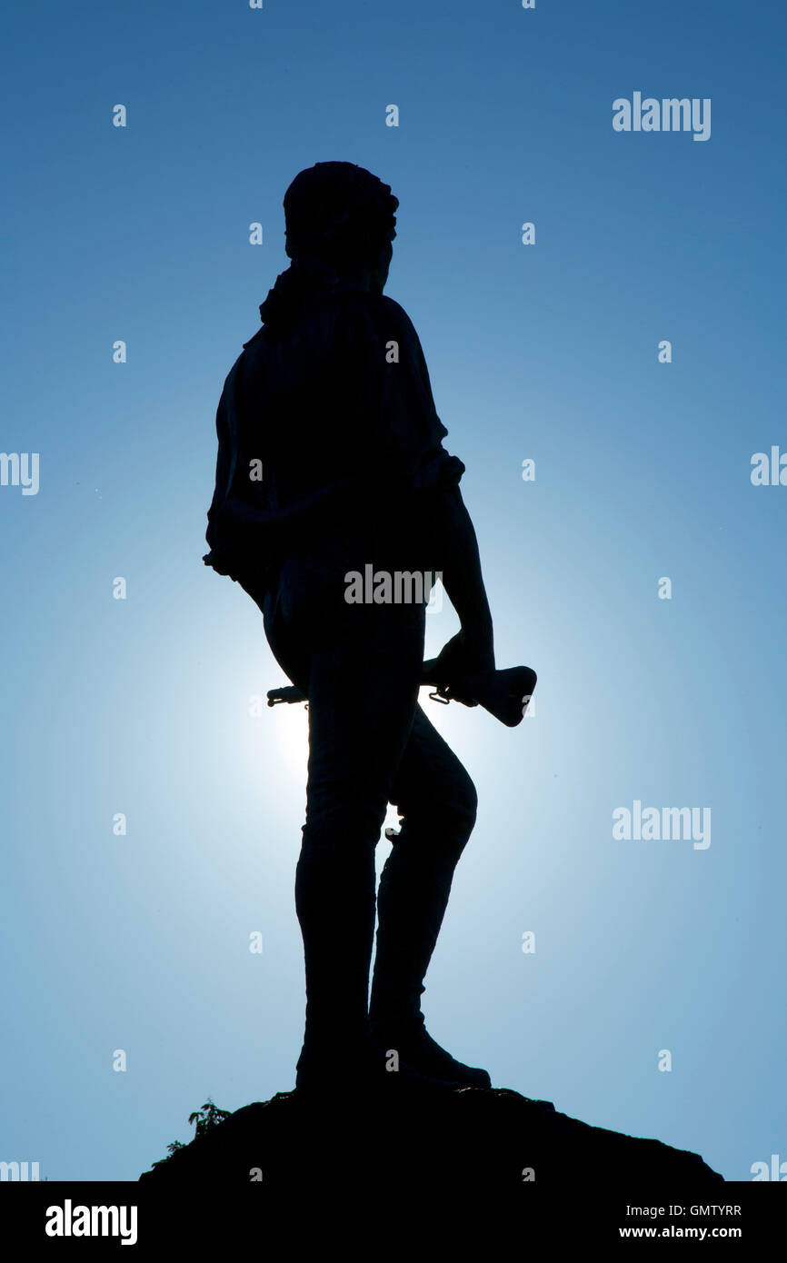 Captain Parker statue on Battle Green in silhouette, Lexington Green, Lexington, Massachusetts Stock Photo