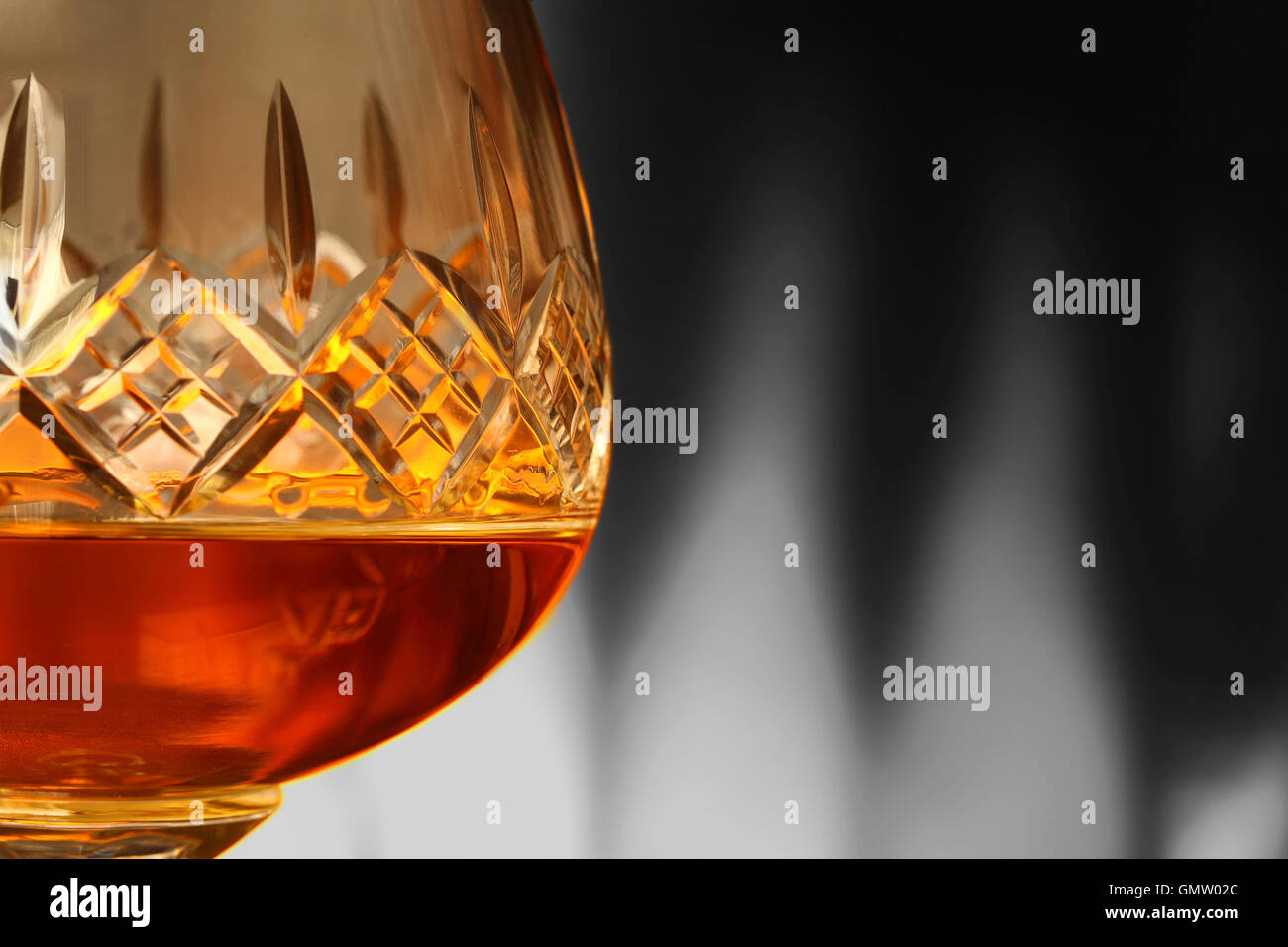 Brandy in glass selective color Stock Photo Alamy