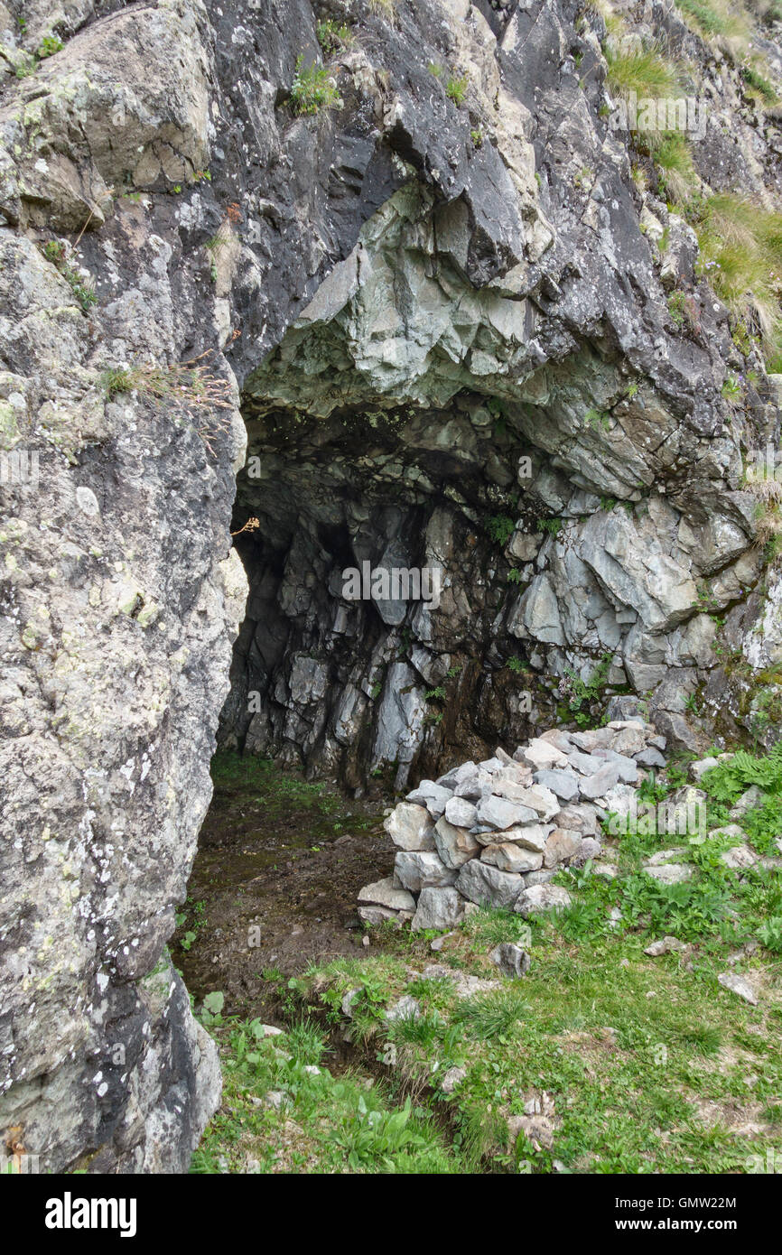 The Dolomites, Italy. At Sas dal Musc above the Passo San Pellegrino are Italian dugouts and rock shelters from World War I Stock Photo