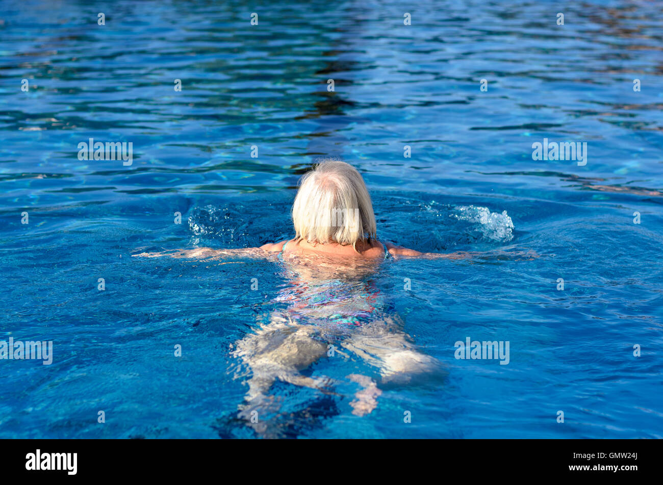 Senior woman swimming pool hi-res stock photography and images - Alamy