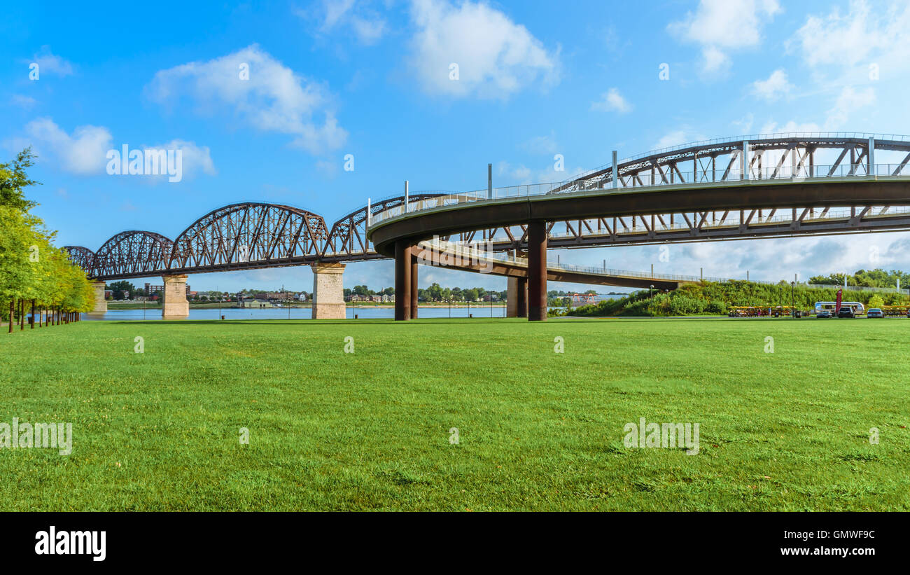 The Big Four pedestrian bridge spans the Ohio River from Louisville KY to Jeffersonville Indiana. Stock Photo