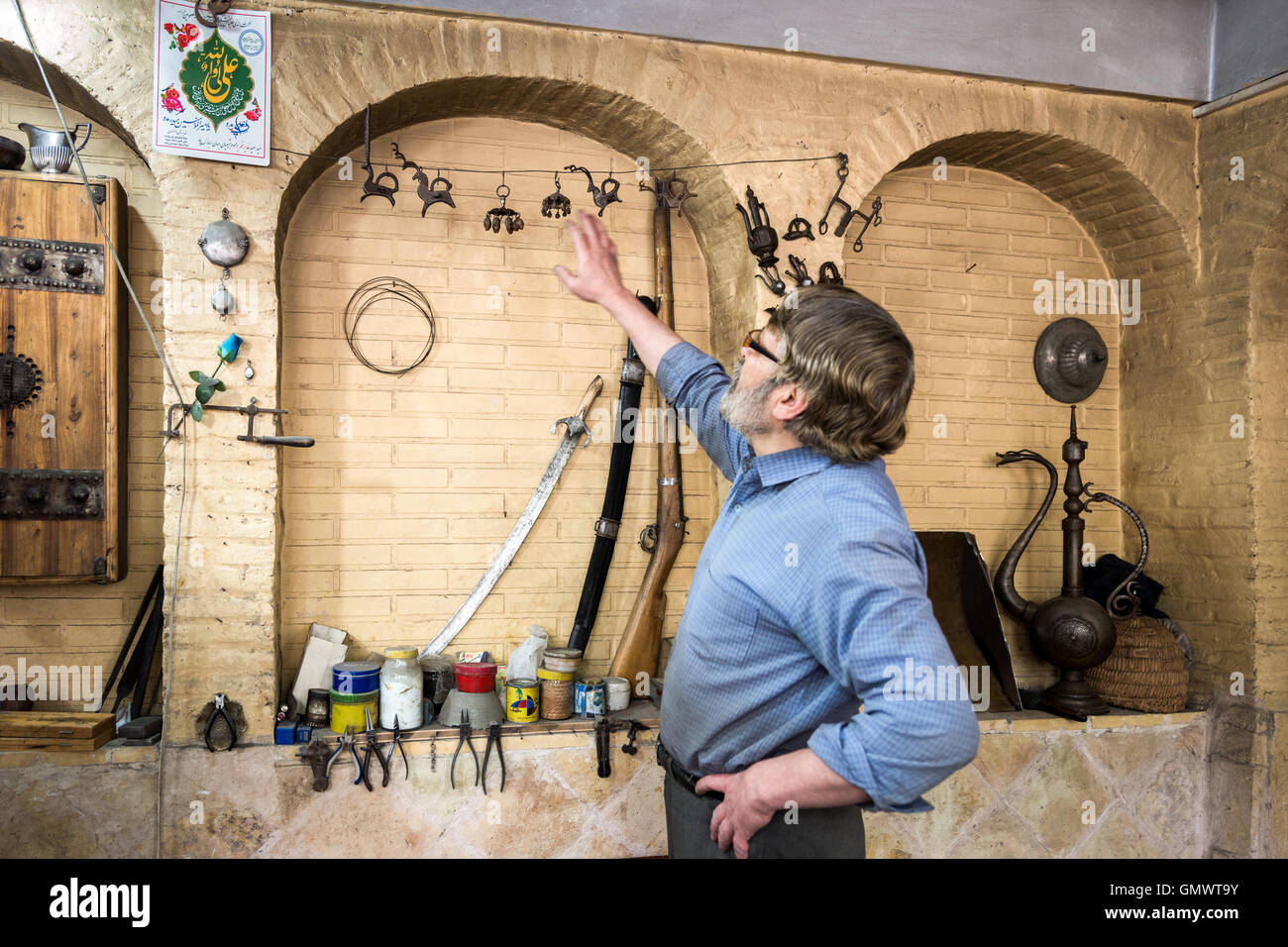 Hassan Minni shows novelty locks that he and his sons have made in the ...