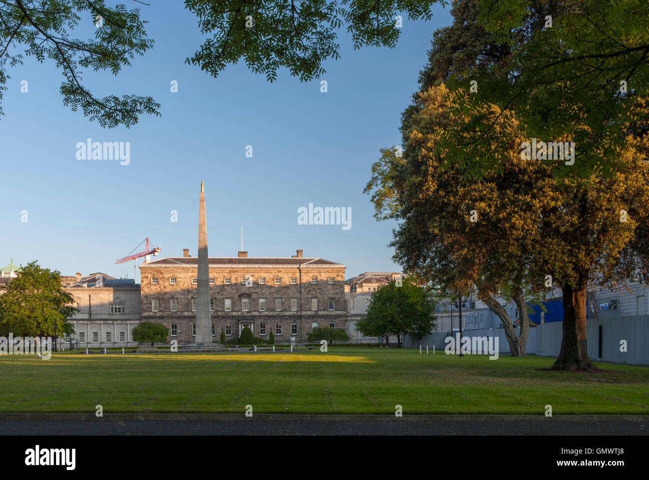 Dublin's Leinster House is home to the Irish parliament or Oireachtas Éireann with striking sidelighting. Stock Photo