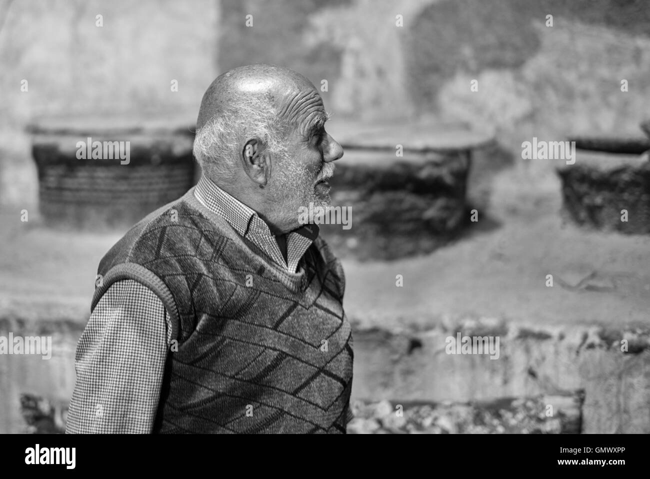 Mohammed Mehdi Mohhebi , oil processing shop owner in Isfahan, Iran.  A black and white portrait. Stock Photo