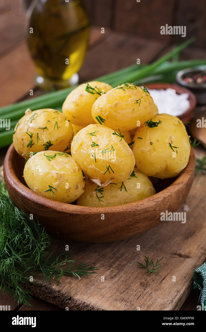 Boiled new potatoes seasoned with dill and butter Stock Photo Alamy
