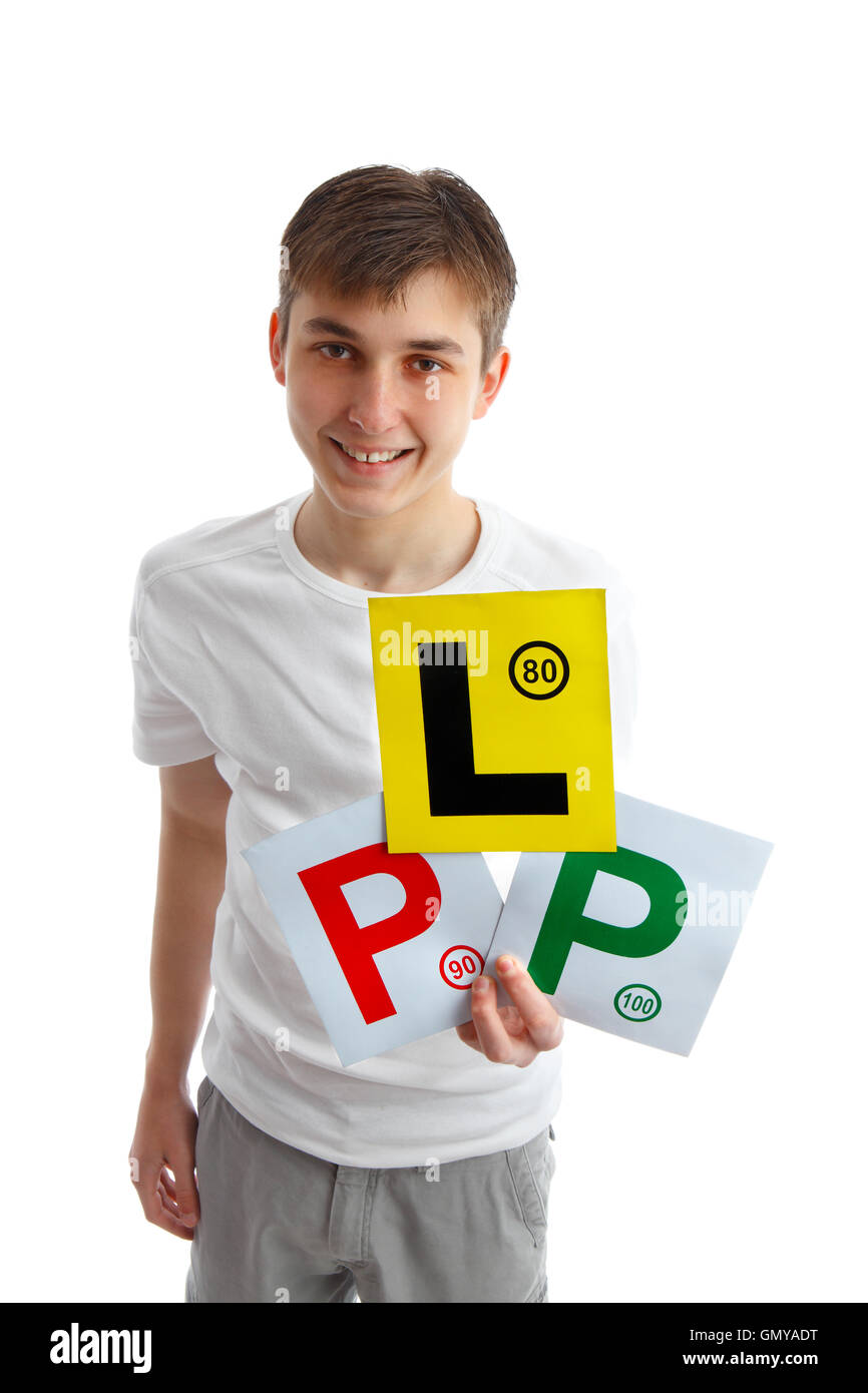 Teen holding magnetic driving licence plates for car Stock Photo