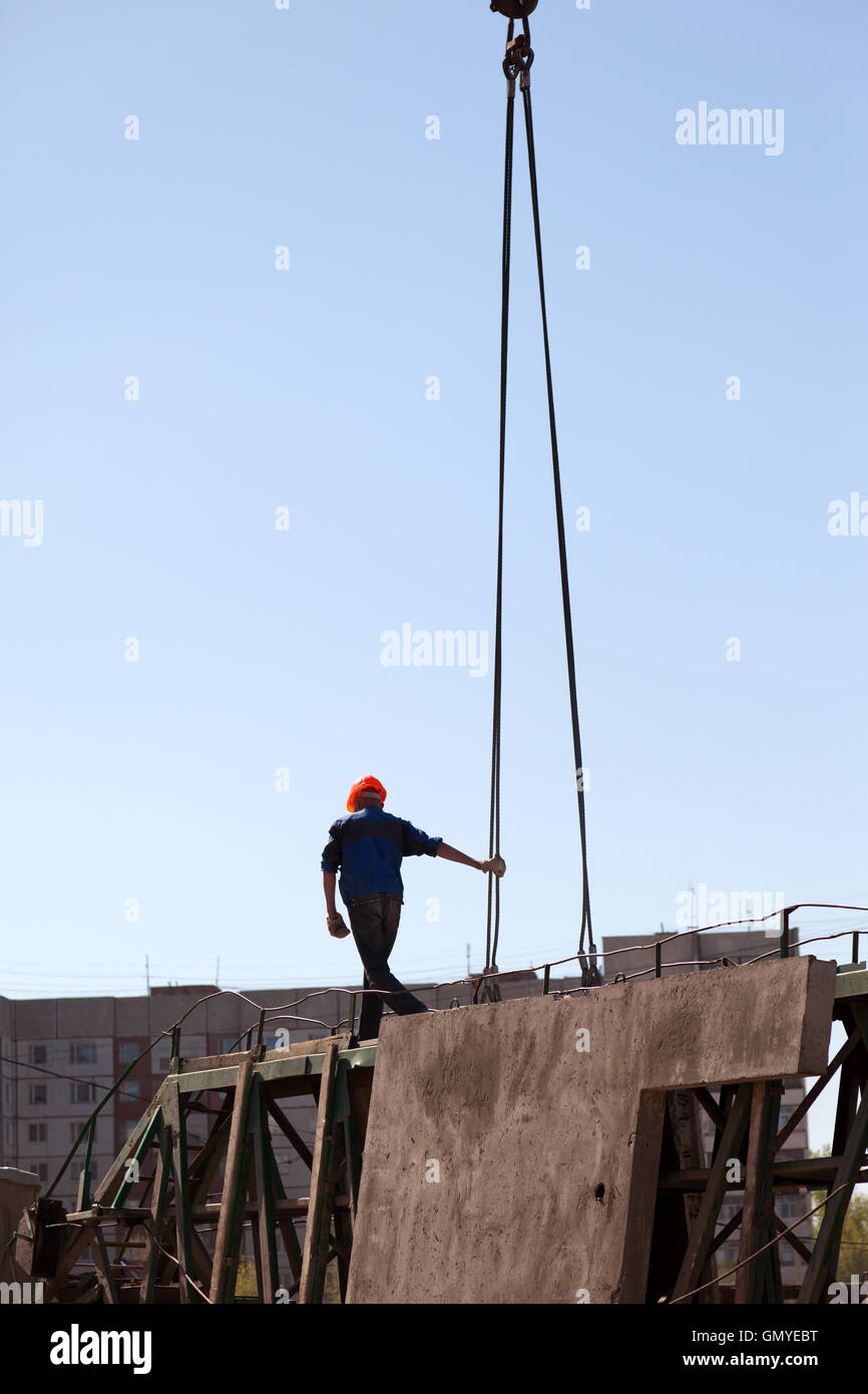 Worker men building construction Stock Photo - Alamy