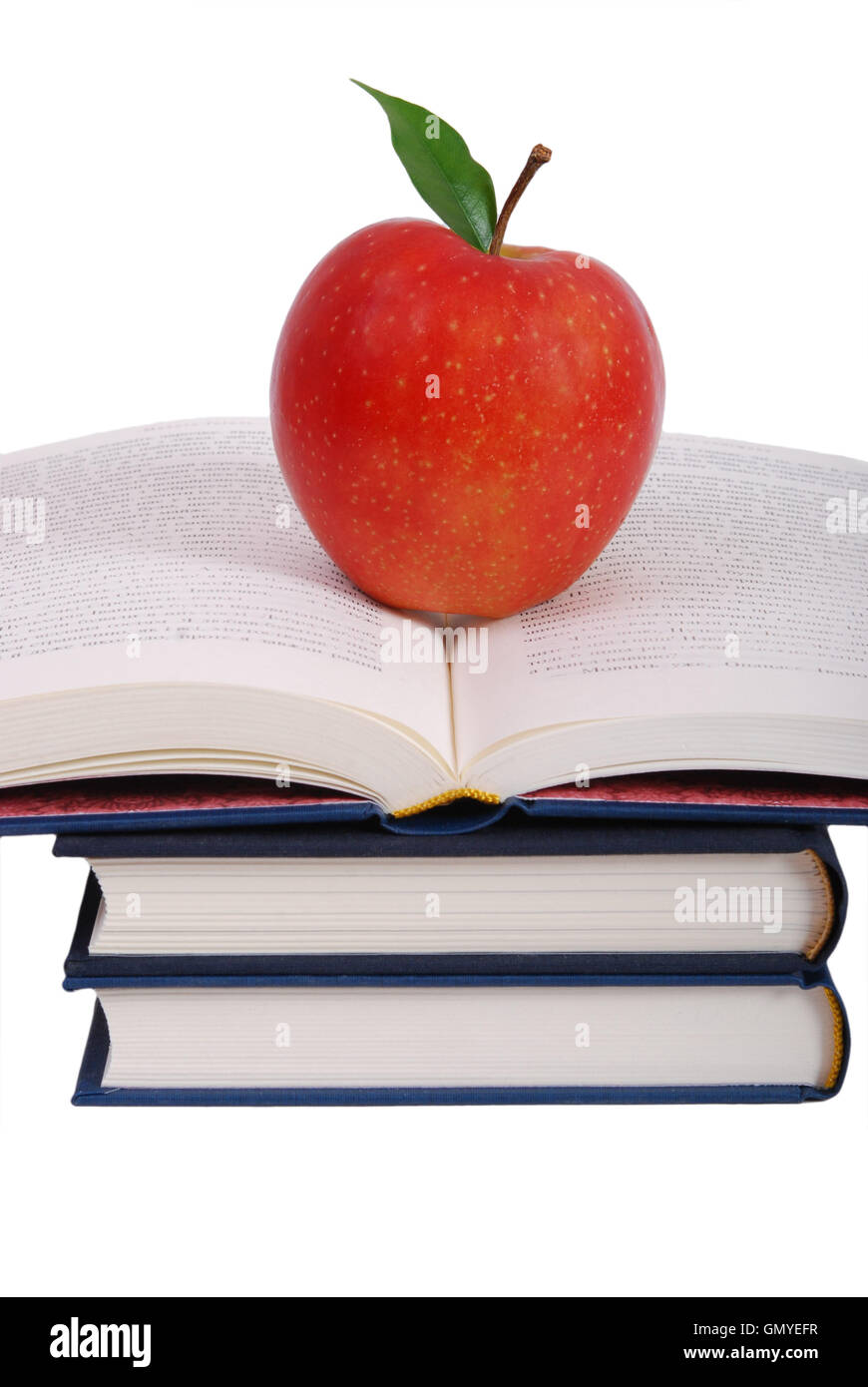 Books tower with apple isolated on white Stock Photo - Alamy
