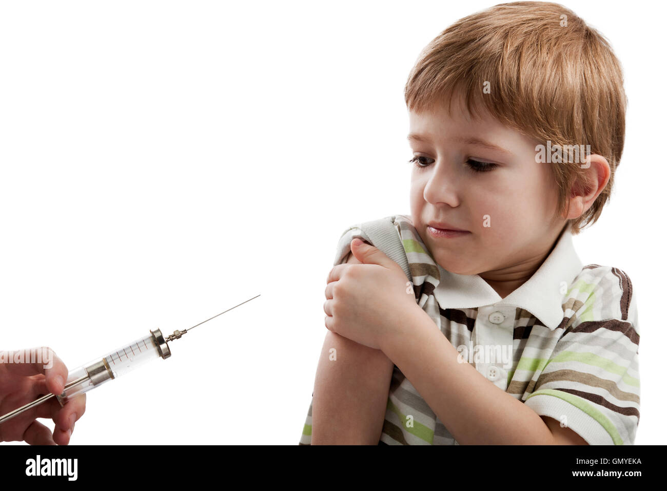 Syringe injecting child Stock Photo