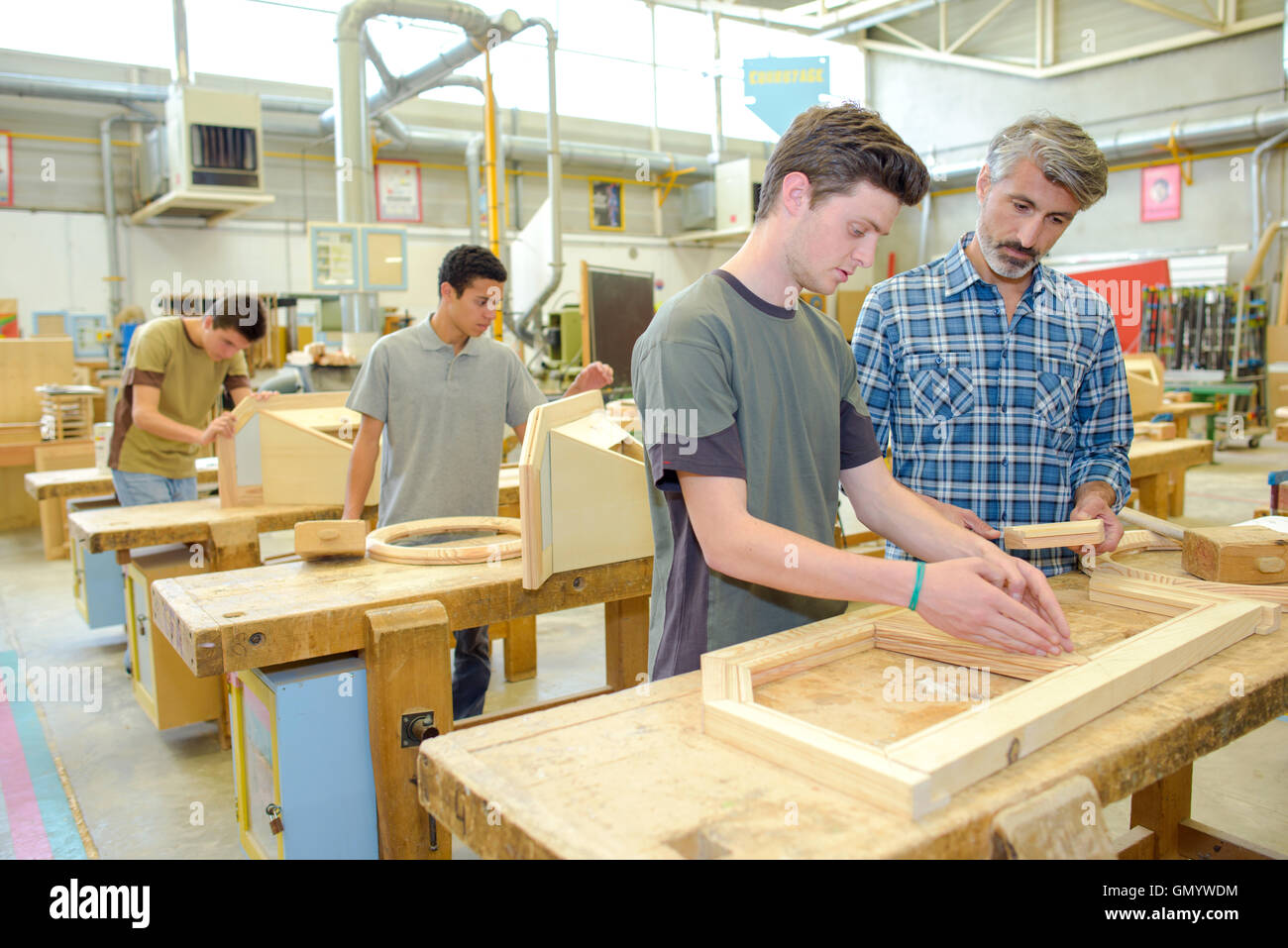 Students in a woodwork class Stock Photo Alamy