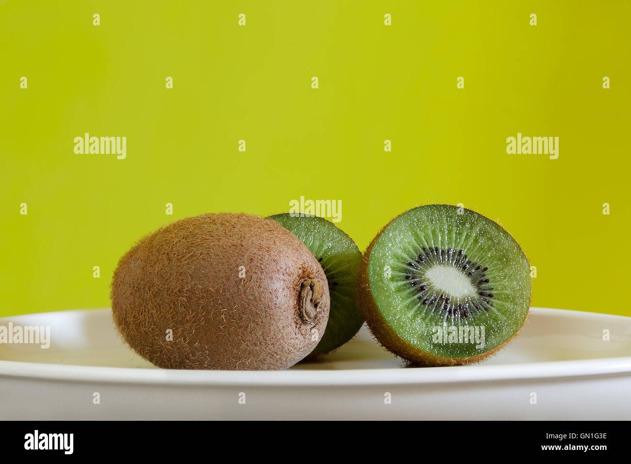 Sliced and whole Kiwi fruits Stock Photo Alamy
