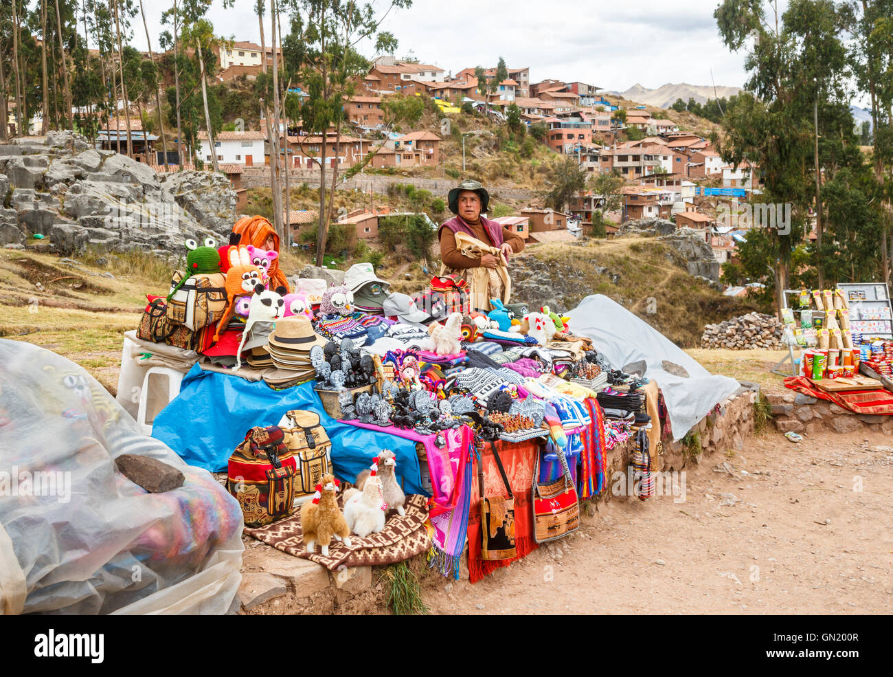 Local people and lifestyle stall selling colourful souvenirs in Q'enqo