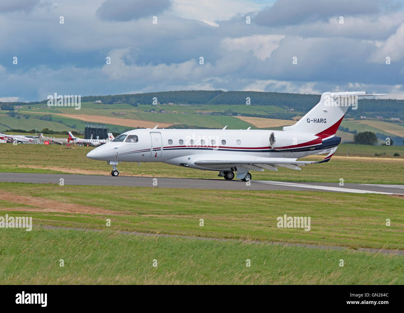 Brazilian Built Embraer Legacy 500 G-HARG arriving at Inverness Airport Scotland.  SCO 11,197 Stock Photo