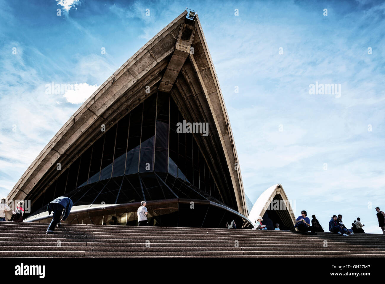 tourists visiting sydney opera house landmark detail in australia on sunny day Stock Photo