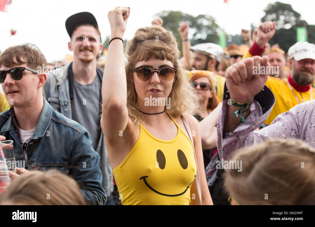 Yellow clad Colonel Mustard music fans Electric Fields music festival at Drumlanrig Castle, Dumfries and Galloway Scotland. Stock Photo