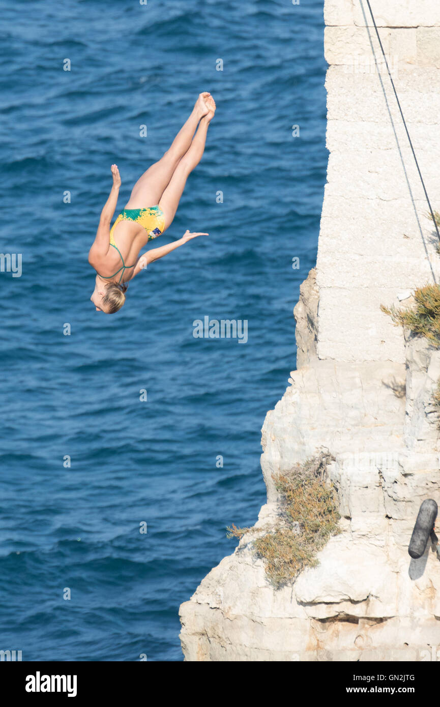 Polignano a Mare, Italy. 27th August, 2016. Rhiannan Iffland from Australia performs her qualification dive during Red Bull Cliff Diving World Series event in Polignano a Mare, Italy. Nicola Mastronardi/Alamy Live News Stock Photo