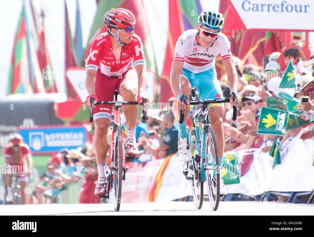 La Camperona, Spain. 27th August, 2016. Jhonatan Restrepo (Katusha Team) and Gatis Smukulis (Astana Pro Team) talks at the finish of the 8th stage of cycling race ‘La Vuelta a España’ (Tour of Spain) between Villalpando and Climb of La Camperona on August 27, 2016 in Leon, Spain. Credit: David Gato/Alamy Live News Stock Photo