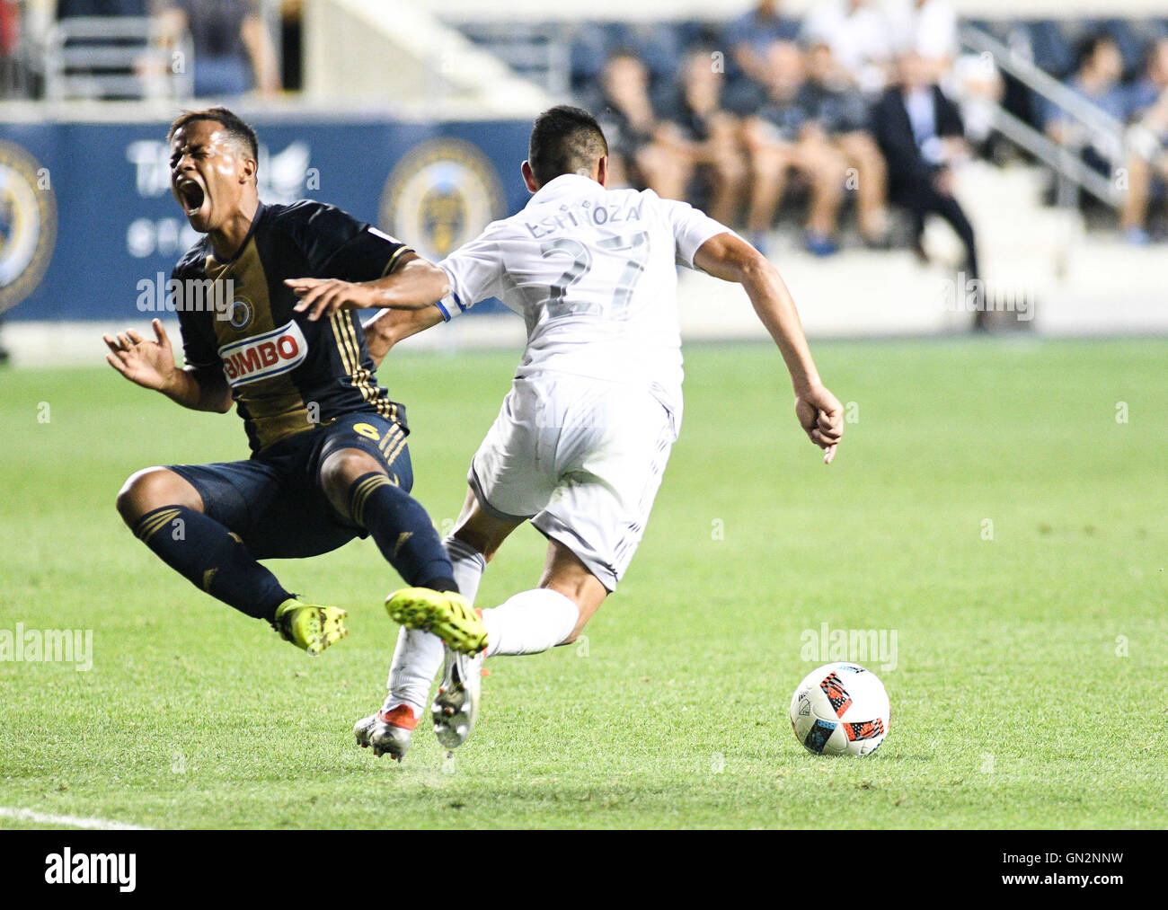 Chester, Pennsylvania, USA. 27th Aug, 2016. Sporting KC player, ROGER ESPINOZA, (27) trips Philadelphia Union's, ROLAN ALBERG (6) during match at Talen Energy Stadium in Chester Pa Credit:  Ricky Fitchett/ZUMA Wire/Alamy Live News Stock Photo