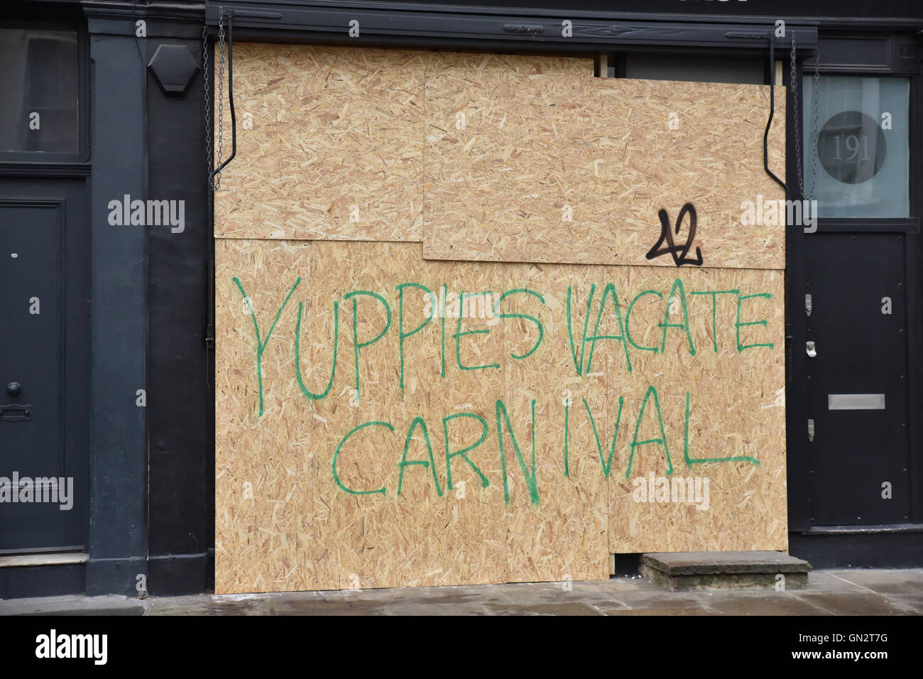 Notting Hill, London, UK. 28th August 2016. Notting Hill Carnival shops westbourne grove boarded