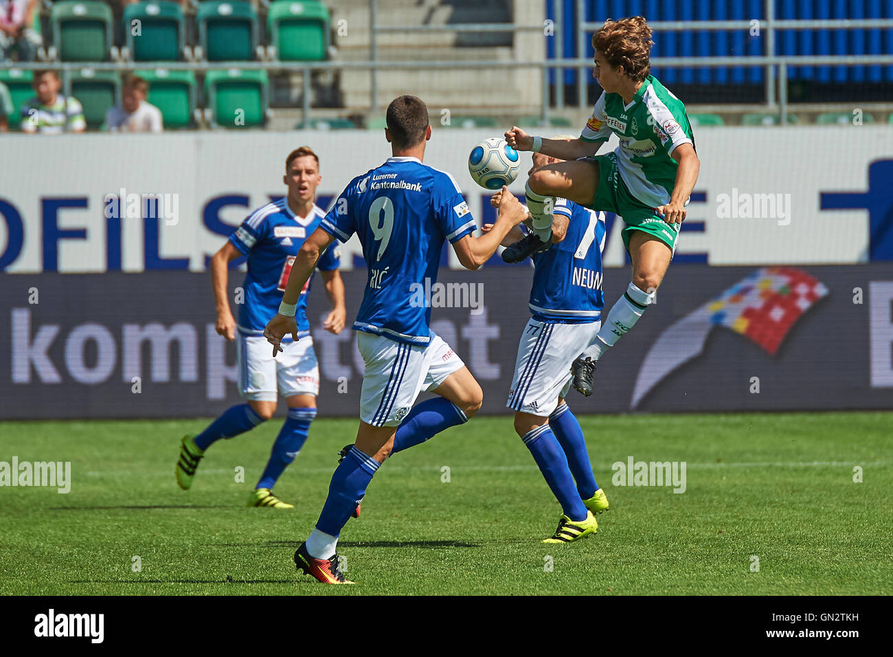 St. Gallen, Switzerland. 28th August 2016. Gianluca Gaudino with full commitment against FC Luzern midfielders during the Raiffeisen Super League Match FC St. Gallen vs. FC Luzern. Credit:  Rolf Simeon/Alamy Live News Stock Photo