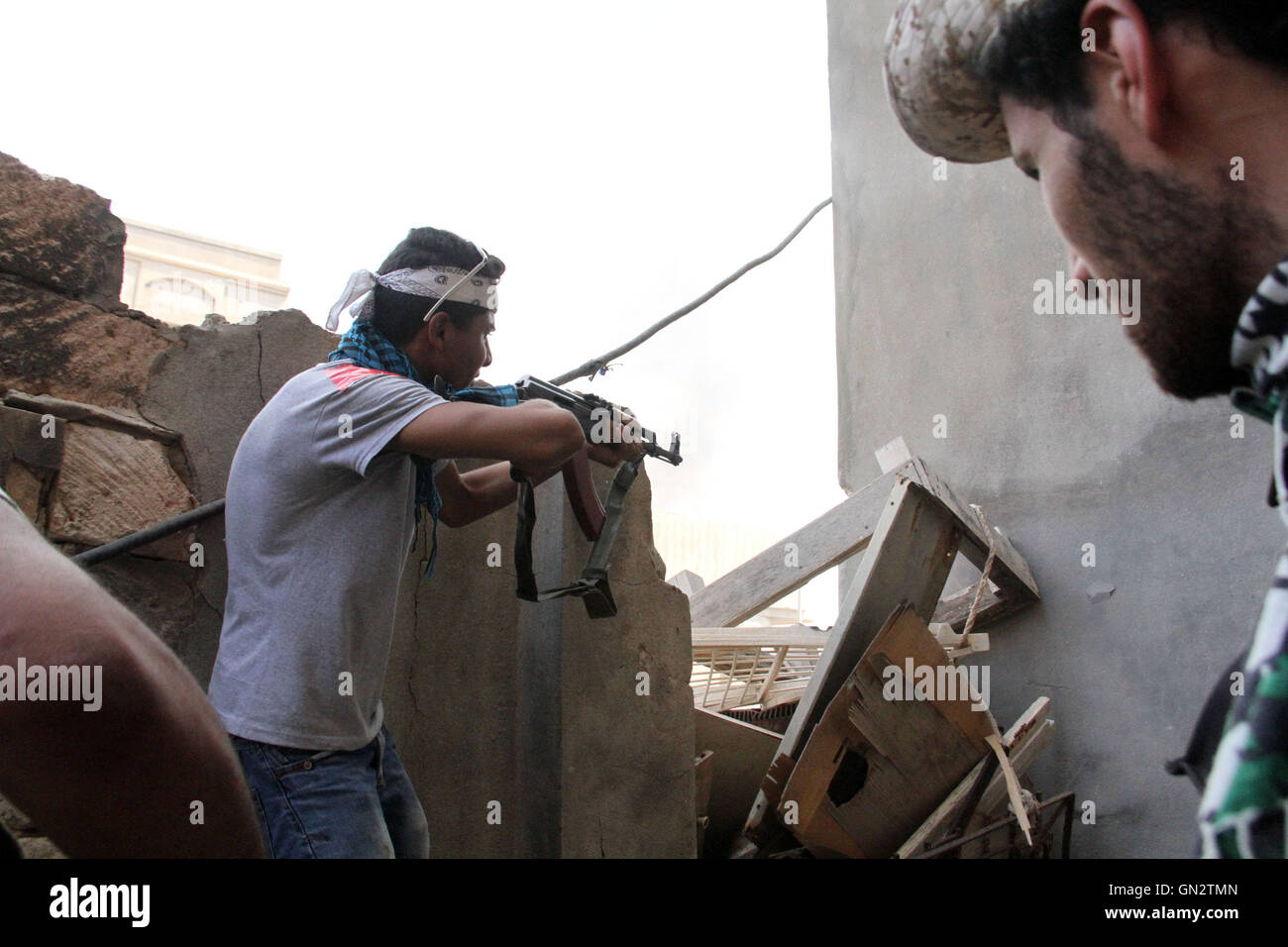 Sirte, Libya. 28th Aug, 2016. A member of the forces loyal to Libya's ...