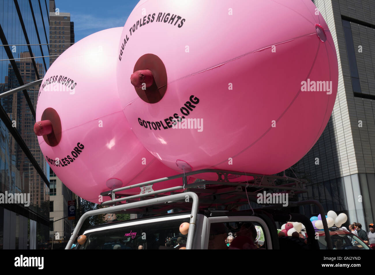 New York, New York, USA. August 28 - Large inflated breasts in the 2016 Go Topless Parade in New York City Credit:  Cal Vornberger/Alamy Live News Stock Photo