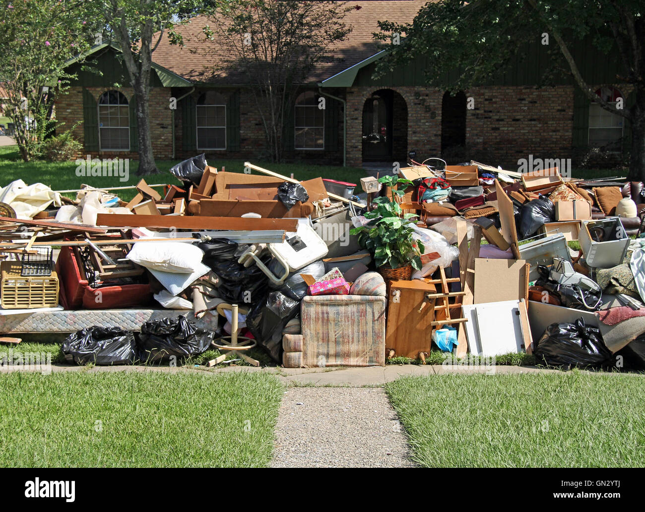 BATON ROUGE - AUGUST 20: Cleaning up after the flood of 2016 in Baton Rouge, LA. Stock Photo