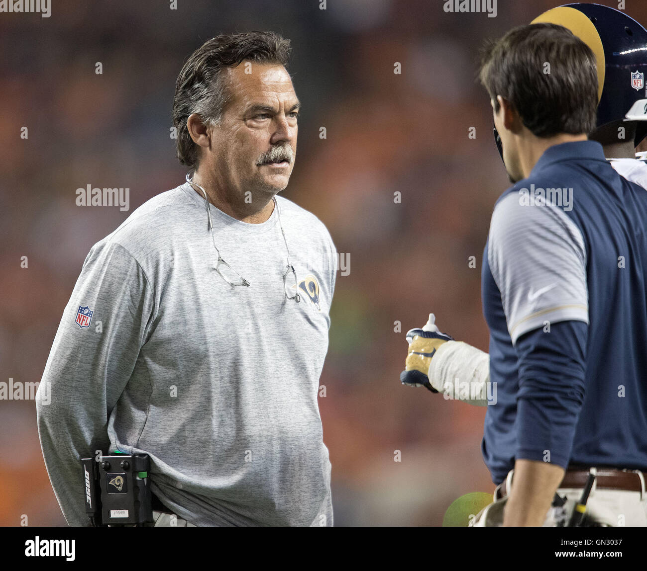 Denver, Colorado, USA. 27th Aug, 2016. Rams Head Coach JEFF FISHER, left, looks on at an injured player during the 2nd. Half at Sports Authority Field at Mile High Saturday night. The Broncos beat the Rams 17-9. © Hector Acevedo/ZUMA Wire/Alamy Live News Stock Photo