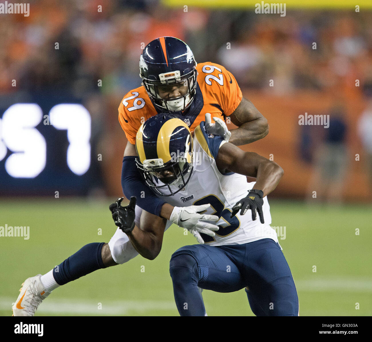 Denver, Colorado, USA. 27th Aug, 2016. Broncos CB BRADLEY ROBY, top, breaks up a pass to Rams WR MICHAEL THOMAS, below, during the 1st. Half at Sports Authority Field at Mile High Saturday night. The Broncos beat the Rams 17-9. © Hector Acevedo/ZUMA Wire/Alamy Live News Stock Photo