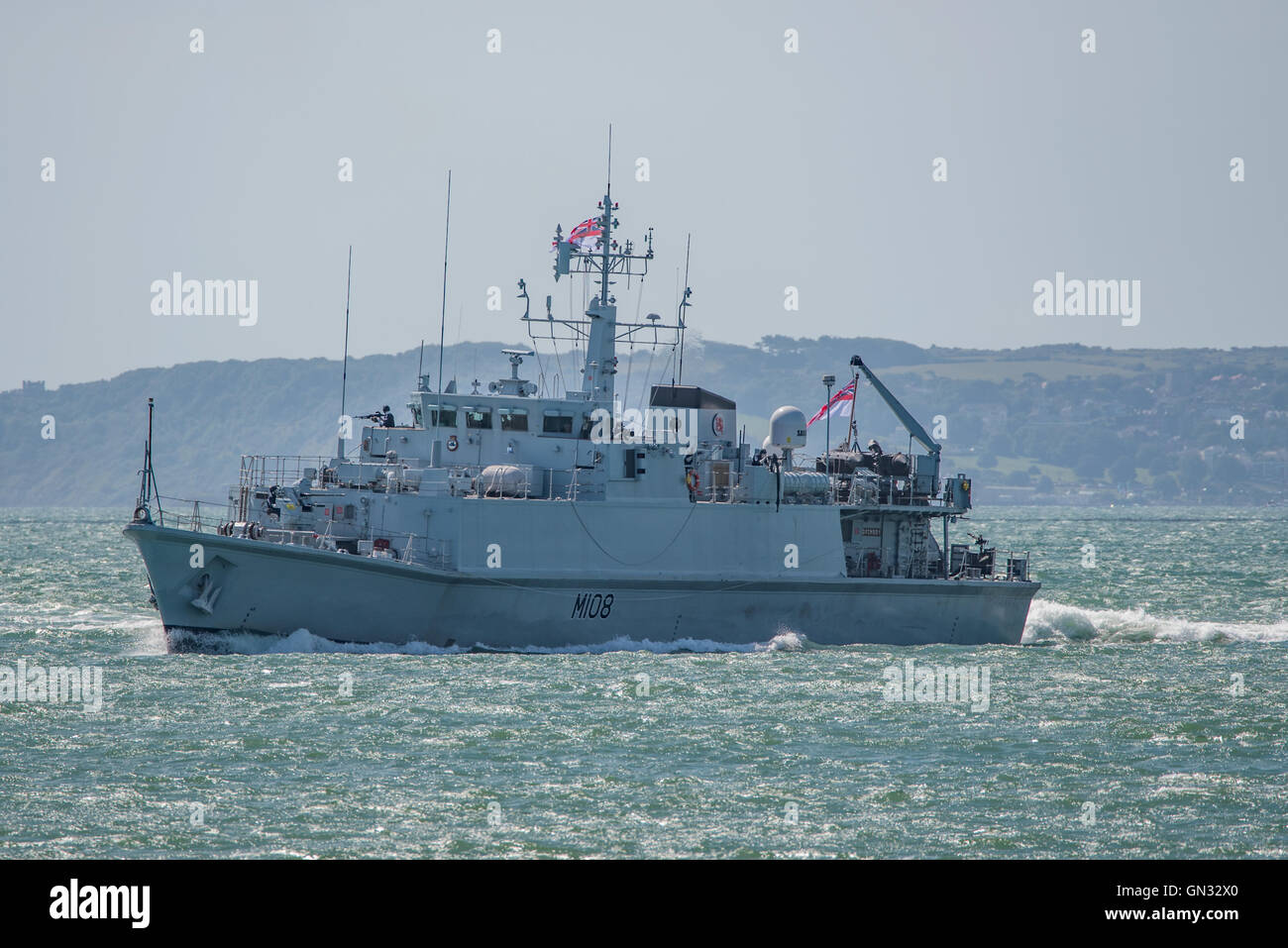 The British Royal Navy Mine Warfare Vessel, HMS Grimsby in demonstration action at Bournemouth Air Festival, UK on the 21st August 2016. Stock Photo