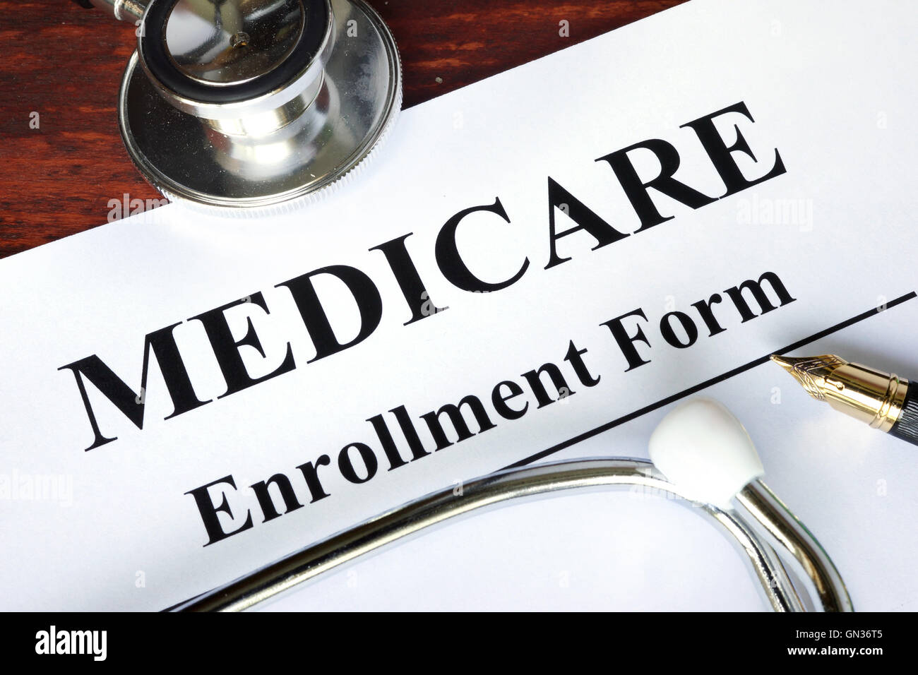 Medicare enrollment form written on a paper.  Medical concept. Stock Photo