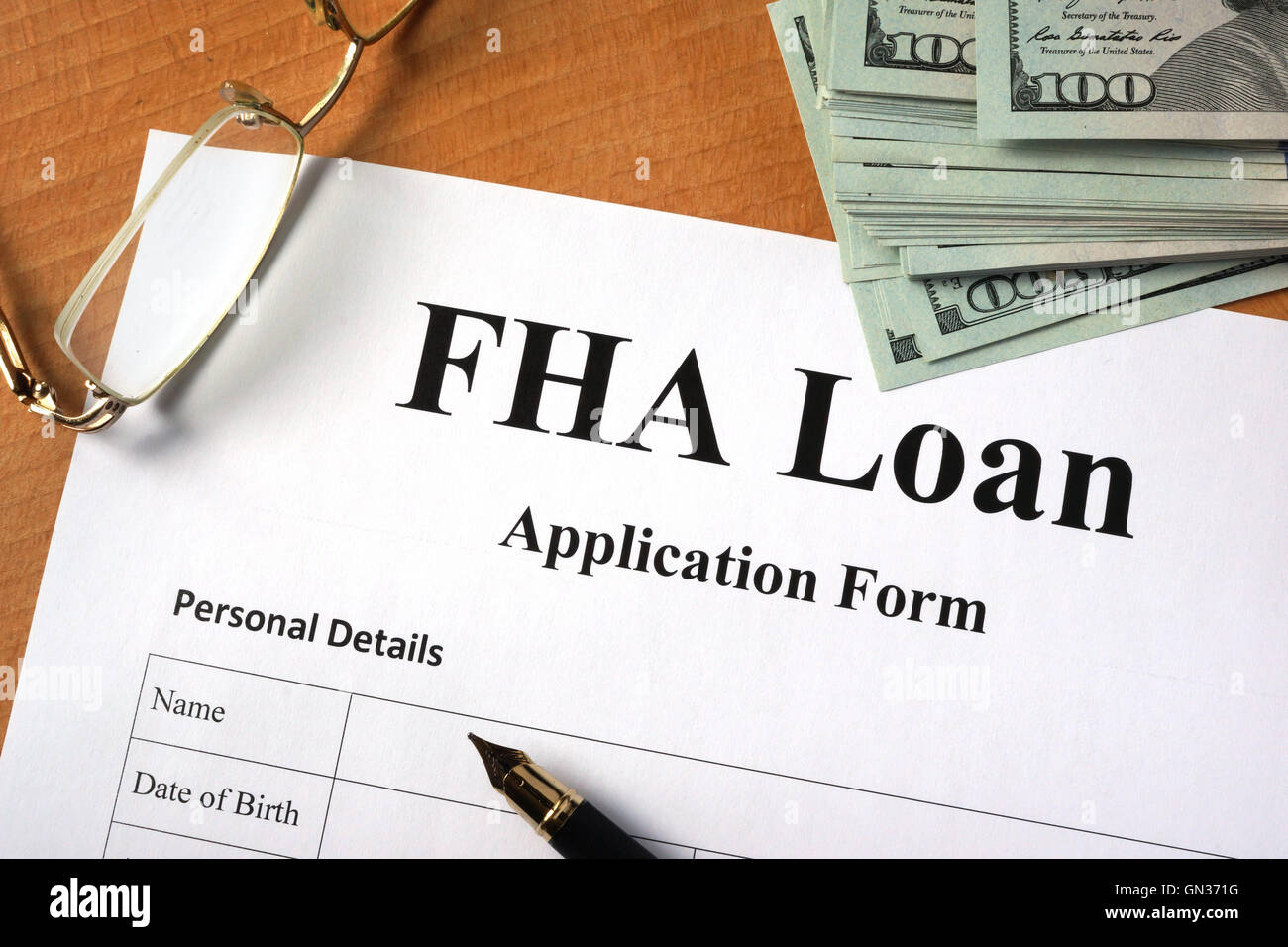 FHA loan form on a wooden table. Stock Photo