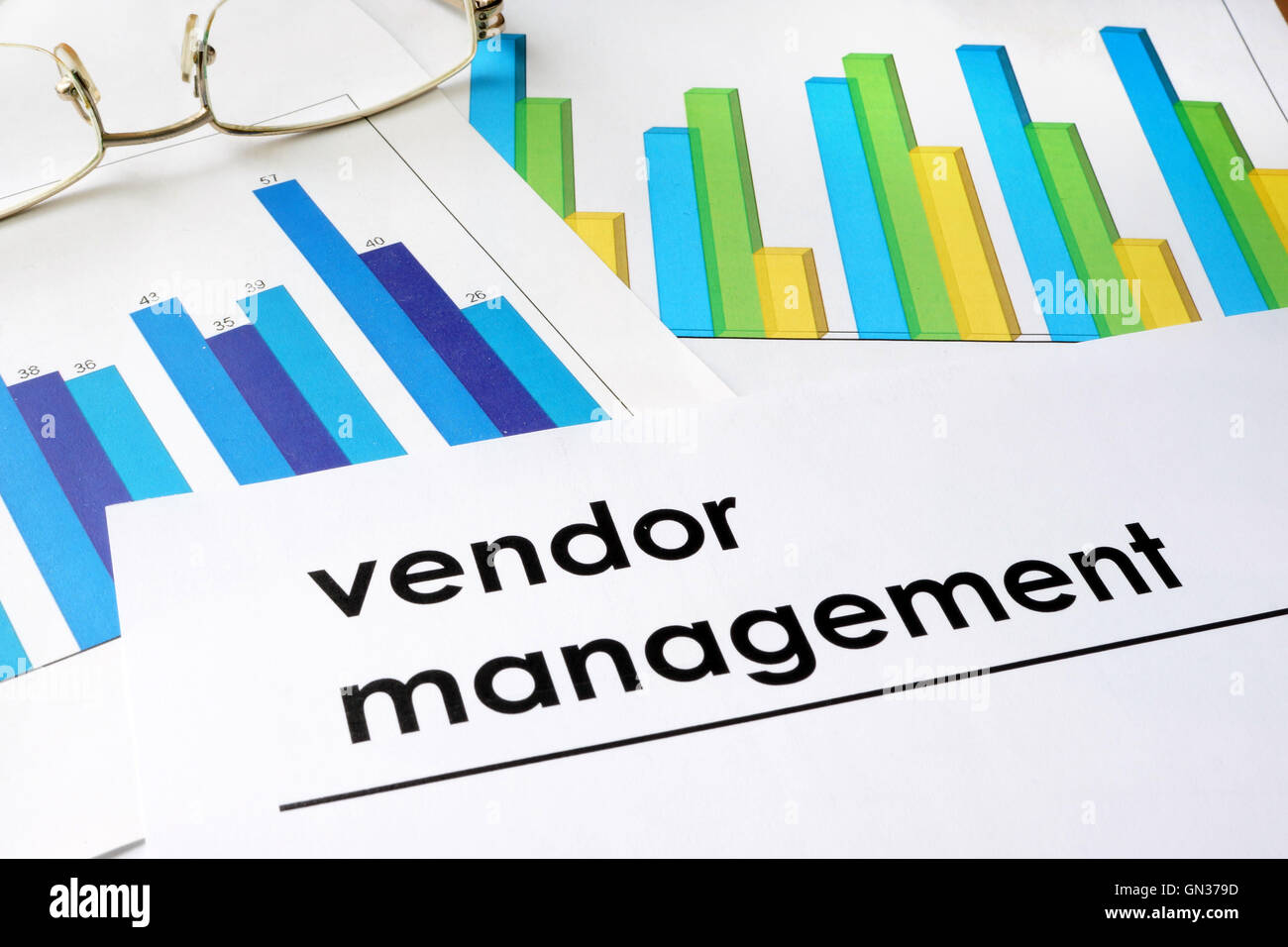 Paper with words Vendor management and charts. Stock Photo