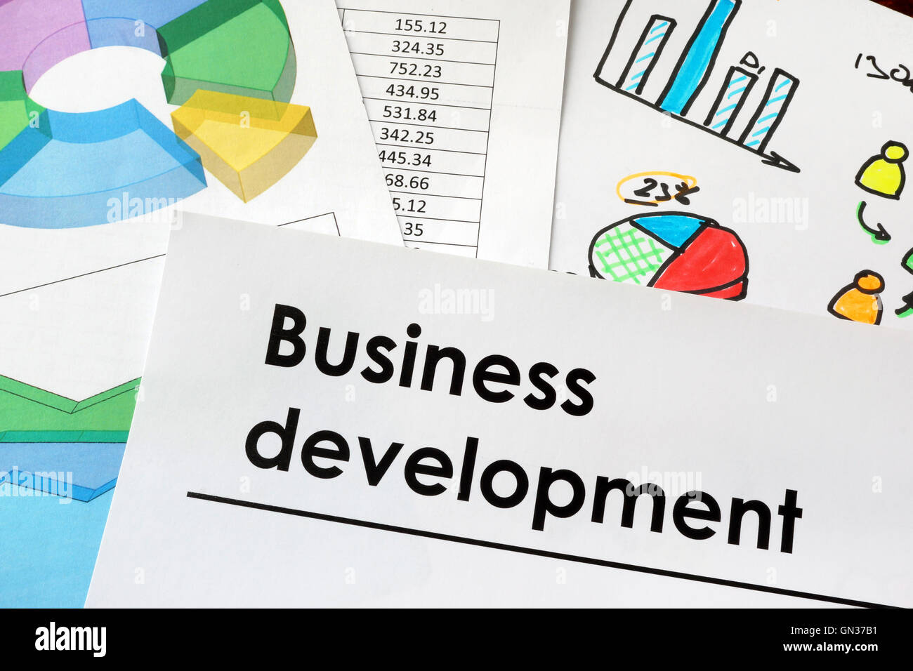 Business development sign written on a paper. Stock Photo