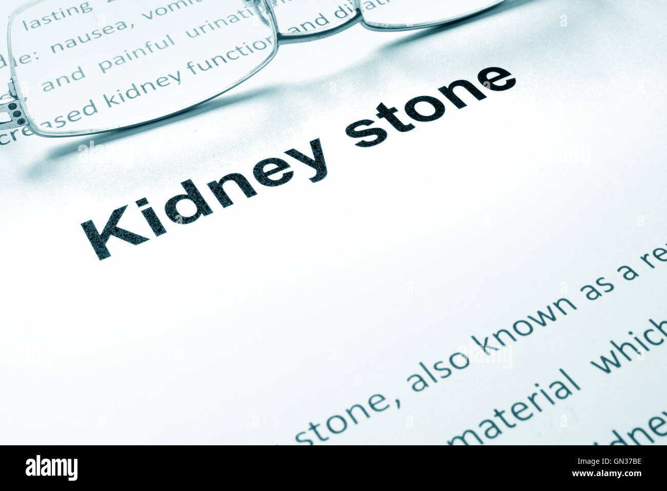 Kidney stone sign on a paper and glasses. Stock Photo