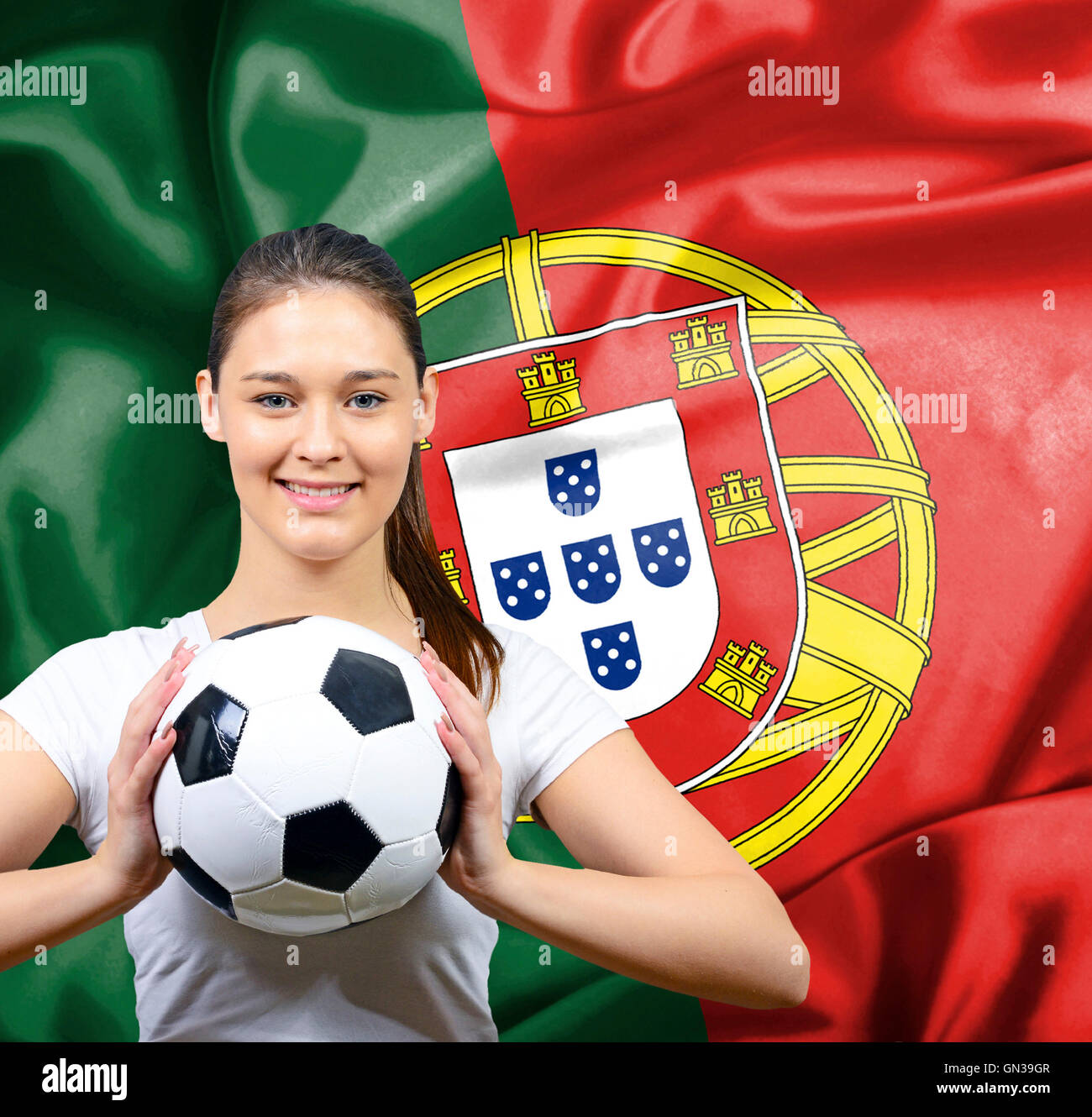 Proud woman football fan of Portugal Stock Photo