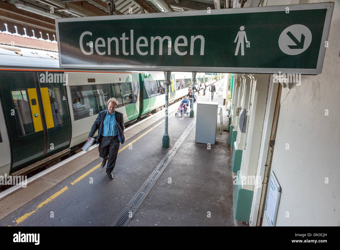 A commuter using the platform toilet facilities near Brighton station ...
