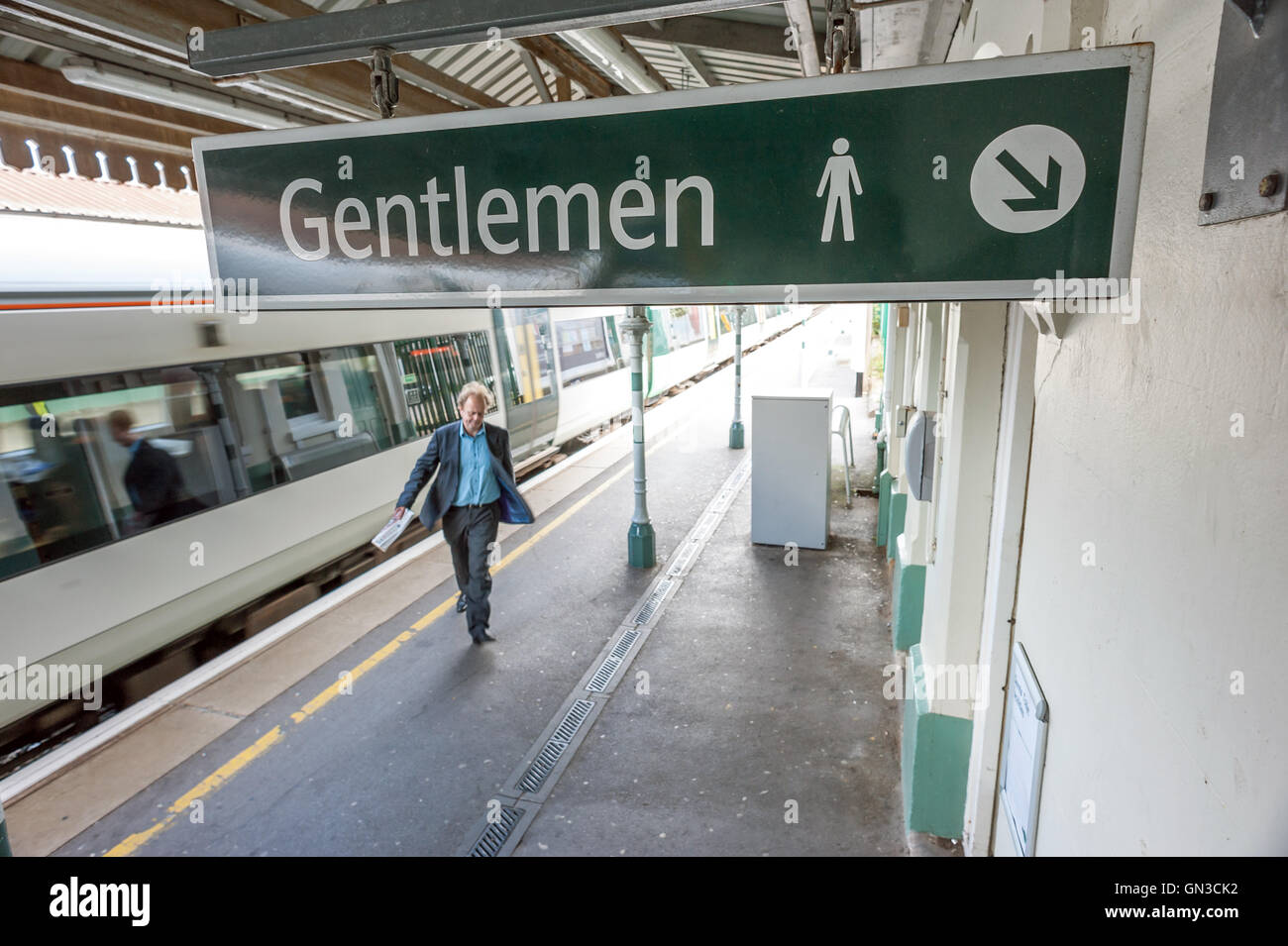 A commuter using the platform toilet facilities near Brighton station ...