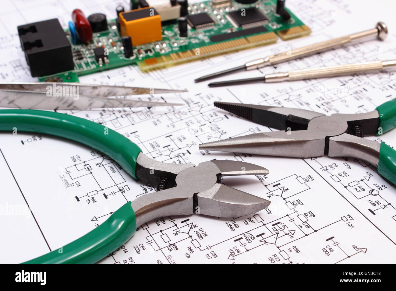 Printed circuit board with electrical components and precision tools ...