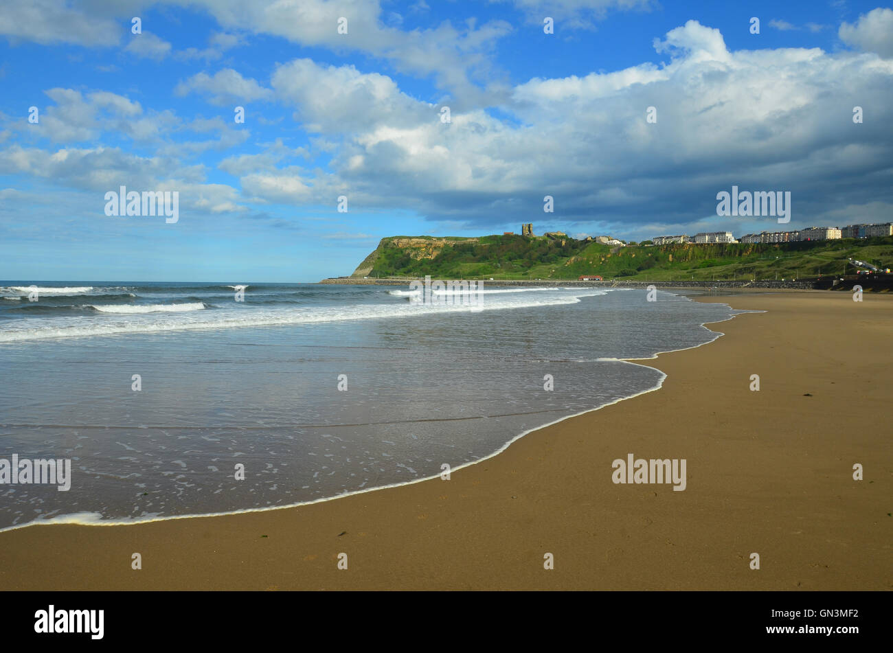 View from Scarborough beach looking towards the castle Stock Photo