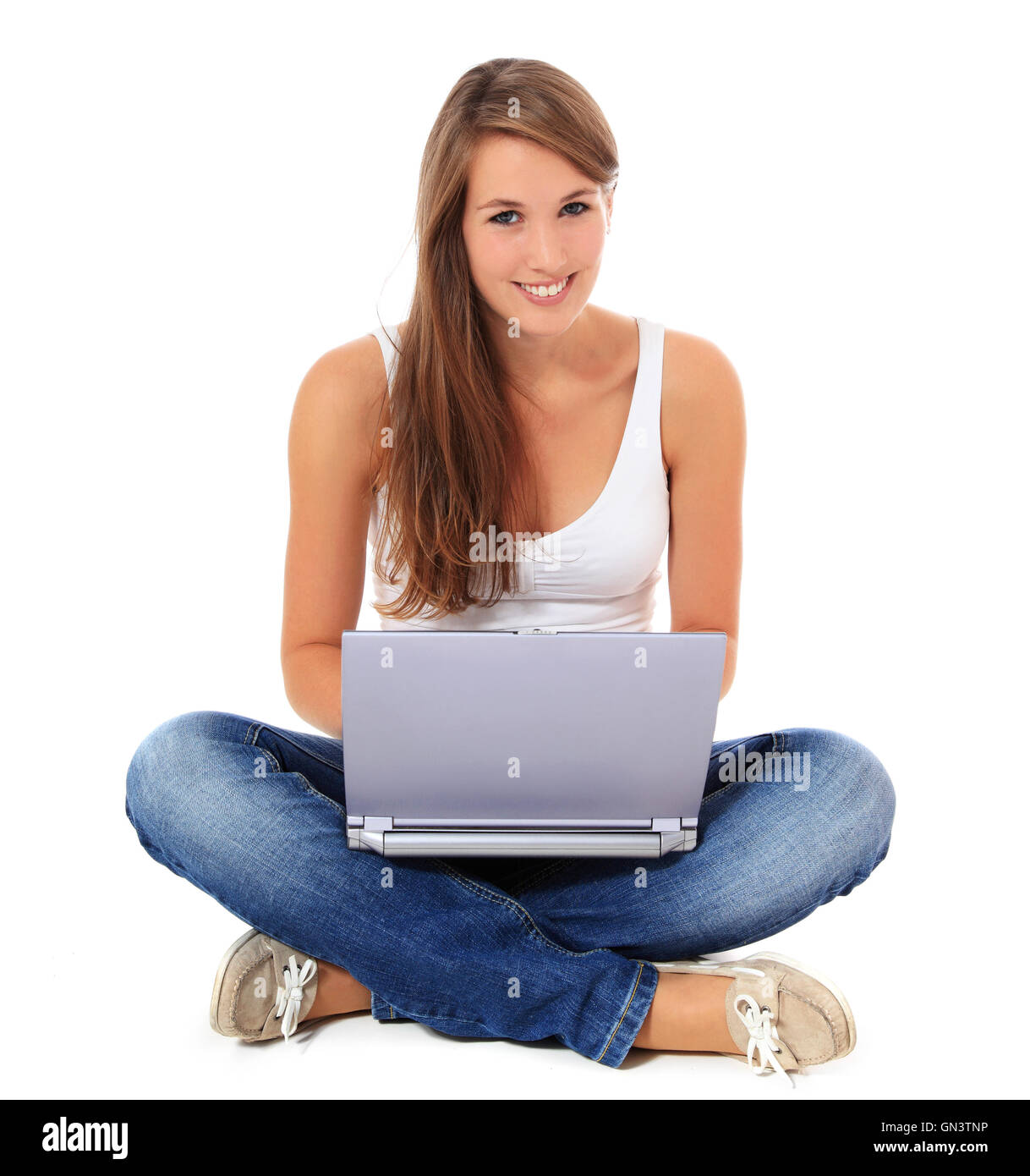 Woman using notebook Stock Photo - Alamy