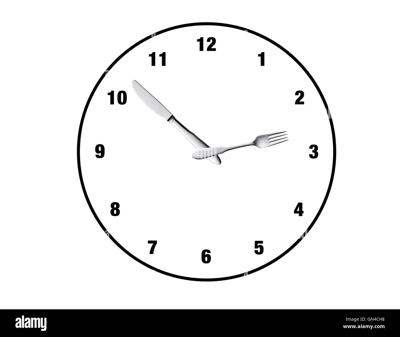 Clock made of spoon and fork, isolated on white background Stock Photo