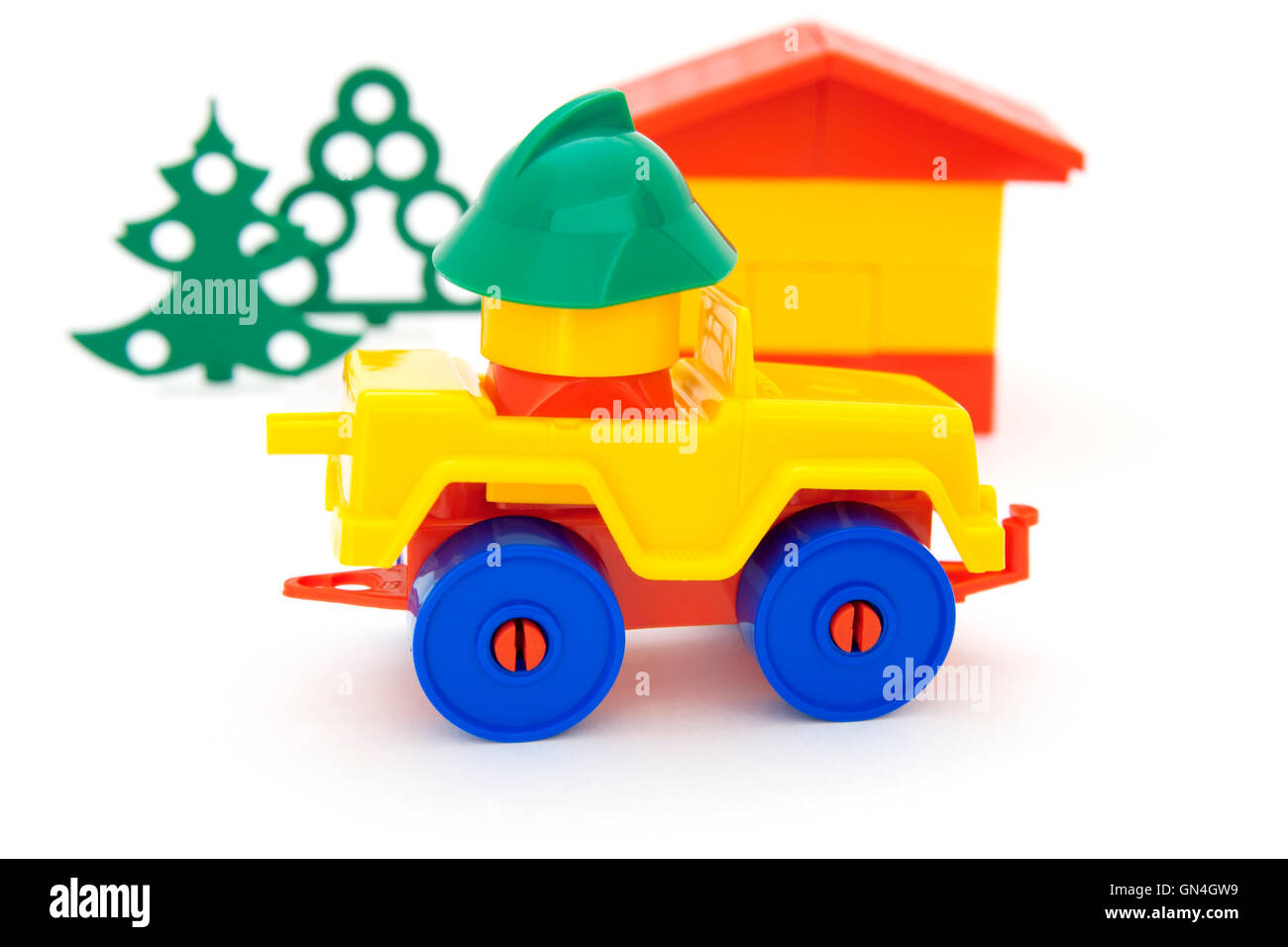 Bright toy car house and tree Stock Photo - Alamy