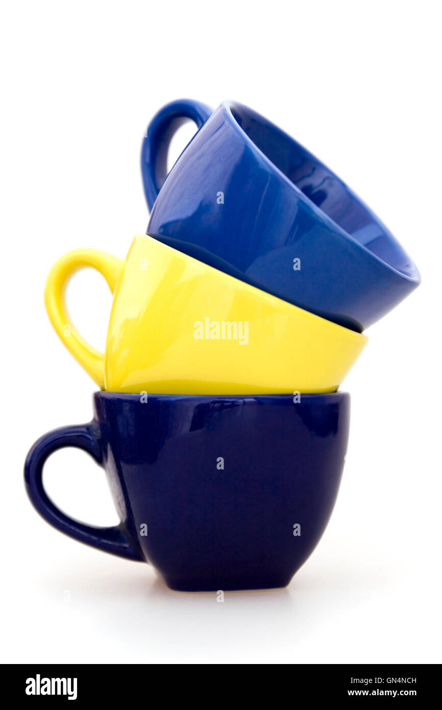 Three multi colored tea cups Stock Photo Alamy