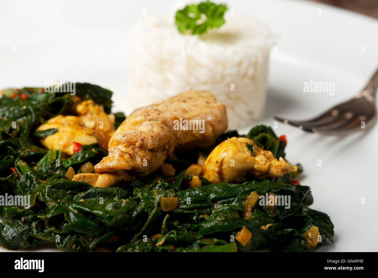 indian murgh palak spinach chicken dish Stock Photo Alamy